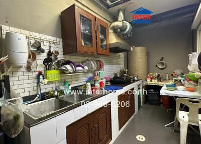 well-equipped kitchen with modern appliances and ample storage