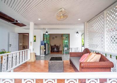 covered veranda with seating area