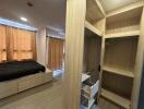 Bedroom with en-suite storage space