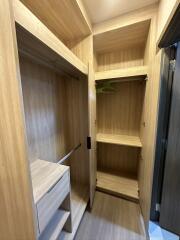 Wooden closet with open and closed storage spaces