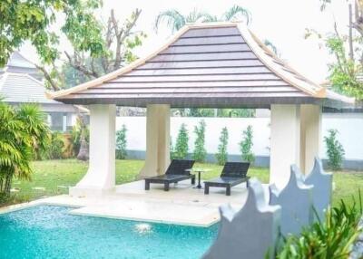 Outdoor living space with pool and pavilion