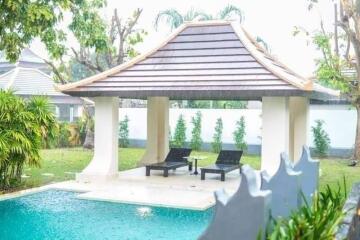 Outdoor living space with pool and pavilion