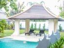 Outdoor living space with pool and pavilion