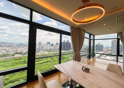 Modern dining area with panoramic city view