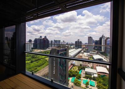 City view from a high-rise balcony