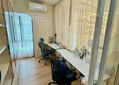 Home office with workstations and chairs