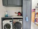 Laundry room with washing machine and dryer