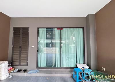 Covered outdoor area with sliding glass doors