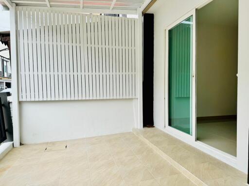 Spacious balcony with sliding glass door