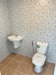 Modern bathroom with sink and toilet