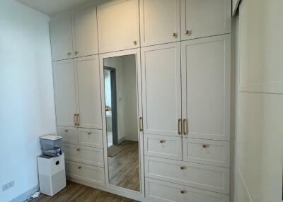 Spacious bedroom with built-in wardrobe