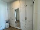 Spacious bedroom with built-in wardrobe