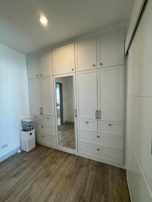 Spacious bedroom with built-in wardrobe