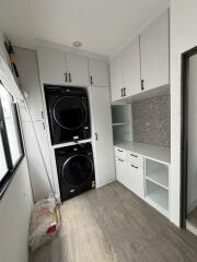 Modern laundry room with washer and dryer