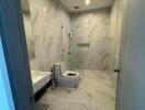 Modern bathroom with marble tiles