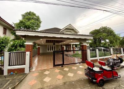 Exterior view of the house with front yard