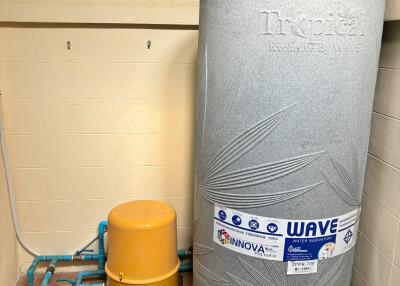 Water tank and pump in the utility room