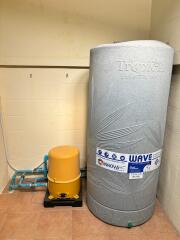 Water tank and pump in the utility room