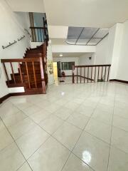 Spacious main living area with stairway