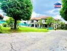 Exterior view of a house with a lush garden