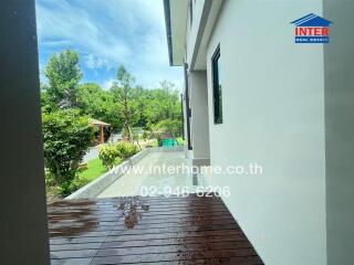 Outdoor patio area with garden view