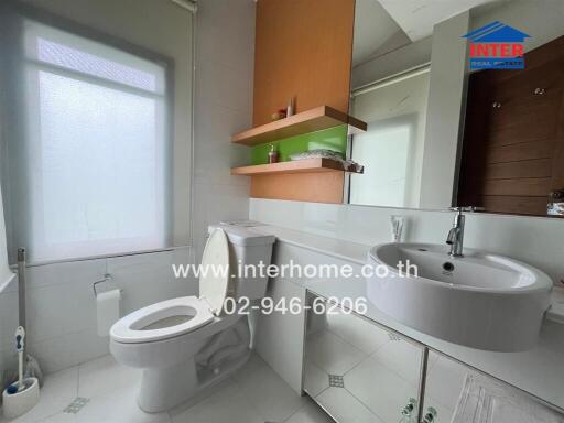 Modern bathroom with toilet and sink