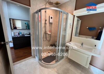 Modern bathroom with glass shower enclosure