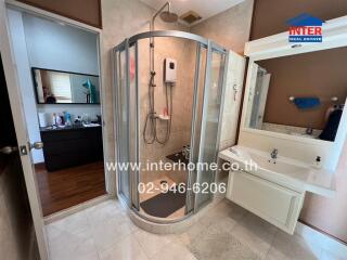 Modern bathroom with glass shower enclosure