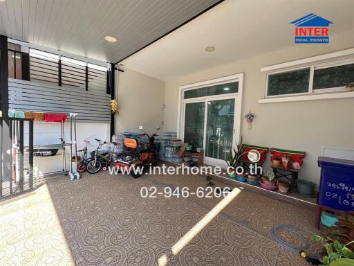 Covered outdoor area with storage and bikes