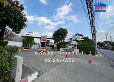 Entrance to residential complex with security gate