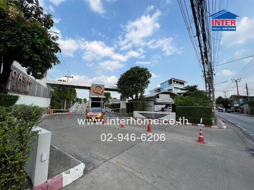 Entrance to residential complex with security gate