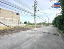 Empty plot of land along a street