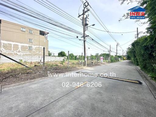 Empty plot of land along a street