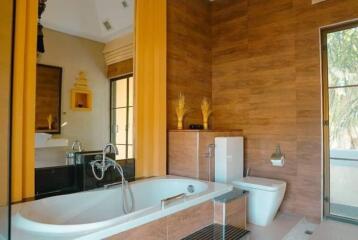 A modern bathroom with wooden accents