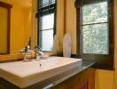 Bathroom with large window and modern sink