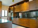 Spacious kitchen with modern wooden cabinetry