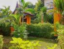 Lush garden space with palm trees and greenery