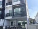 Exterior view of a modern multi-story townhouse