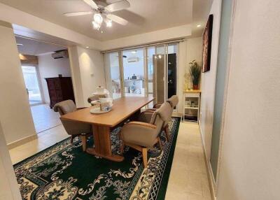 Dining room with modern furniture and a view of adjacent spaces