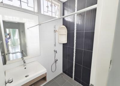 Modern bathroom with black and white tiles