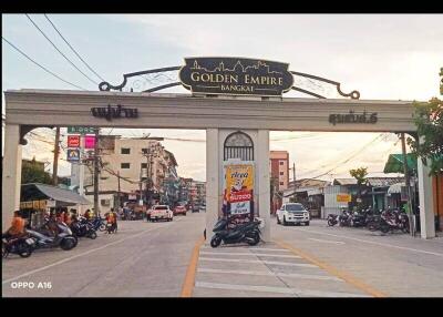 Gate entrance to Golden Empire residential complex in Bangkae