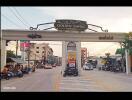 Gate entrance to Golden Empire residential complex in Bangkae