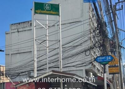 Street view of a building on a sunny day