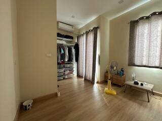 Bedroom with closet and natural light