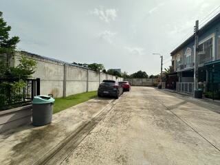 View of the street and parking area outside the property