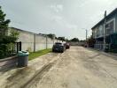 View of the street and parking area outside the property