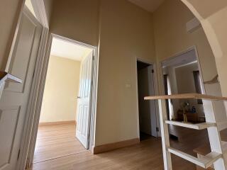 Hallway with doorways leading to other rooms