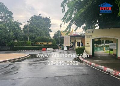 Entrance gate with surrounding greenery