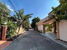 Leafy street view with residential houses