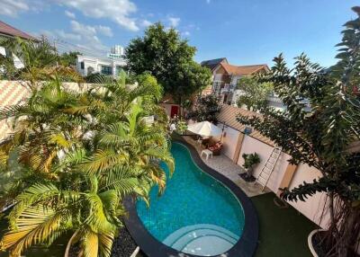 Outdoor area with swimming pool and plants